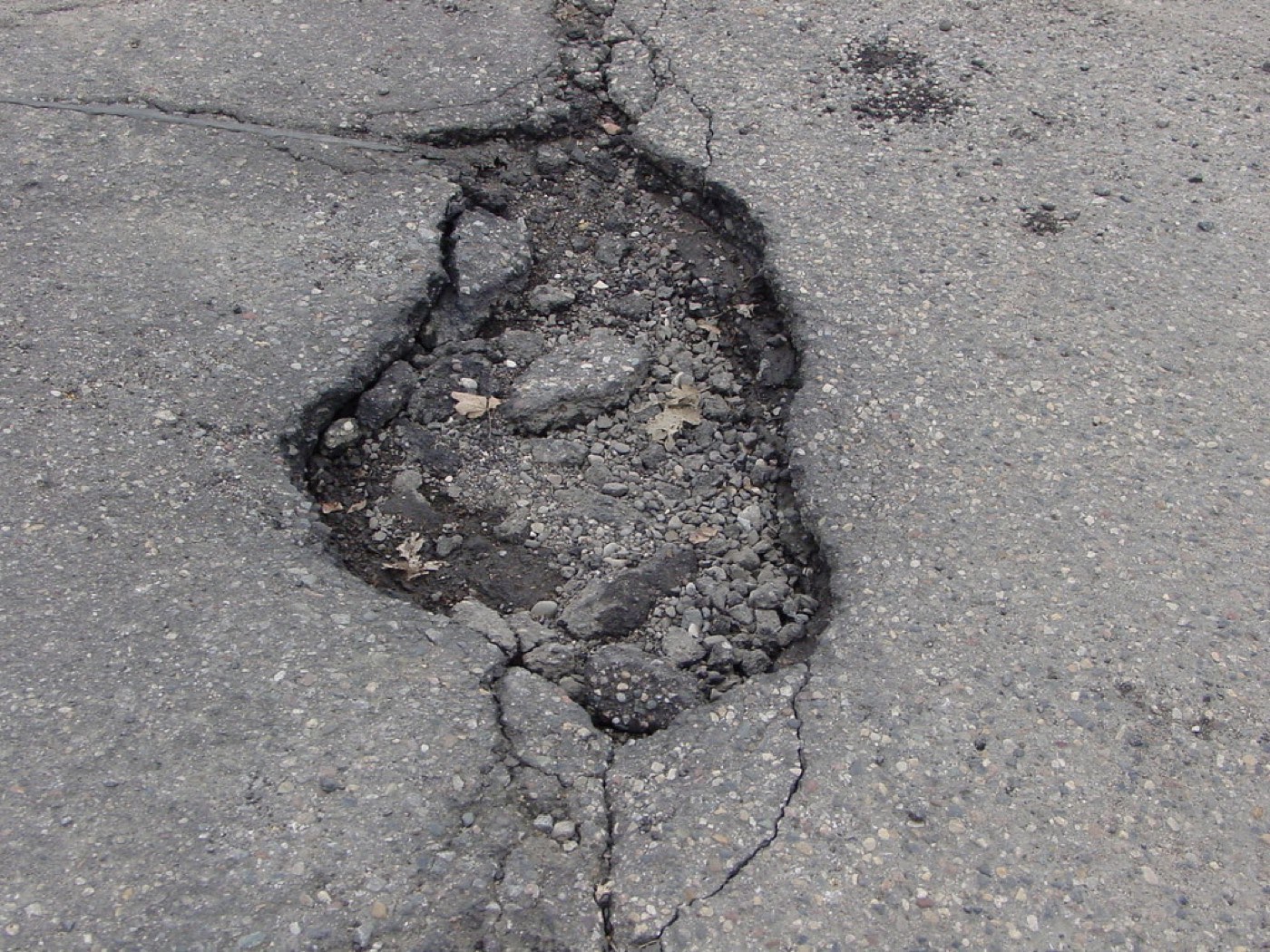 Pothole Damage: How to Spot It and What to Do