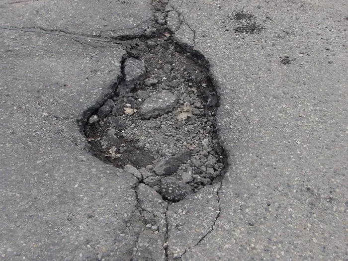 Pothole Damage: How to Spot It and What to Do